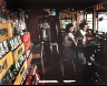 Leo Rubinfien / In a Cafe Beside the Chao Phaya, Bangkok, from the portfolio Map of the East / 1979-1987