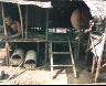 Leo Rubinfien / A Cambodian Refugee in His Hut, Site 8, from the portfolio Map of the East / 1979-1987