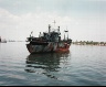 Leo Rubinfien / A Rusty Freighter on the River, Saigon, Vietnam, from the portfolio Map of the East / 1979-1987