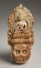 Nepal / Diadem Plaque with a Buddha Surmounting a Skull / 17th century