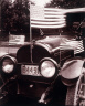 Floyd W. Gunnison / Automobile with American flags / 1916