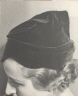 Ilse Bing / Untitled (woman with hat) / 1933