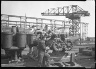 Lewis W. Hine / Worker Turning Wheel / ca. 1905-1940