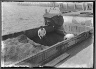 Lewis W. Hine / Coal Stevedores Loading on Barges / ca. 1905-1940