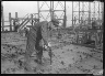 Lewis W. Hine / Bolting Steel Plates On Big Steel Ships / ca. 1905-1940