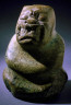 Unknown / Seated figure of were-jaguar wide mouth, showing large teeth; arms crossed over chest / Pre-Columbian