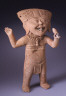 Unknown / Standing smiling figure holding a rattle / 6th - 8th century