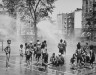 Morris Engel / Group of children in park sprinkler / ca. 1937