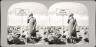 Frank F. Bunker / Woman at sign at summit of Pikes Peak / ca. 1940