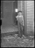 Lewis W. Hine / Boy Lost Arm Running Saw in Box Factory 1909 / 1909
