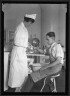 Lewis W. Hine / Health Nurse and Minor Accident / ca. 1909-1935