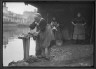Lewis W. Hine / Woman Washing Clothes / 1918-1919