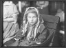 Lewis W. Hine / Italian Child Gets Her First Penney Ellis Island 1926 / n.d.