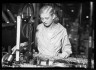 Lewis W. Hine / Woman with Machine / ca. 1906-1938