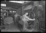 Lewis W. Hine / Rubber Cloth Being Wound / ca. 1906-1938