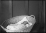 Lewis W. Hine / Baby in a Basket / ca. 1903-1938