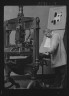 Arnold Genthe / Goudy, Frederick, Mr., at his printing press / 1924 Mar. 15