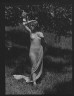 Arnold Genthe / Olson, Margaret, Miss, standing outdoors / 1924 July