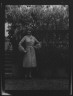 Arnold Genthe / Moylair, Catherine, Miss, standing outdoors / 1928