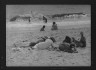 Arnold Genthe / Unidentified group of people, possibly members of the Jewett family, at the beach / between 1911 and 1942