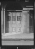 Arnold Genthe / Door set in an arched passageway, New Orleans or Charleston, South Carolina / between 1920 and 1926