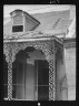 Arnold Genthe / Upper story of a building with wrought iron balcony, New Orleans / between 1920 and 1926