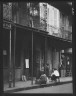 Arnold Genthe / Women on a covered sidewalk, New Orleans / between 1920 and 1926