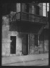 Arnold Genthe / Facade of a multi-story house in the French Quarter, New Orleans / between 1920 and 1926