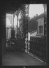 Arnold Genthe / Upper level balconies with wrought iron on St. Peter Street, New Orleans / between 1920 and 1926