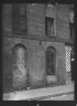 Arnold Genthe / Facade of a multi-story building, New Orleans or Charleston, South Carolina / between 1920 and 1926