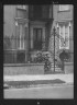 Arnold Genthe / Gate and doorway of a multi-story house, New Orleans or Charleston, South Carolina / between 1920 and 1926