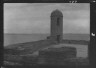 Arnold Genthe / Walls and round tower by the water, New Orleans or Charleston, South Carolina / between 1920 and 1926