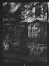 Arnold Genthe / Multi-story house behind a fence, New Orleans or Charleston, South Carolina / between 1920 and 1926