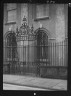 Arnold Genthe / Unidentified building behind a fence, New Orleans or Charleston, South Carolina / between 1920 and 1926