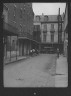 Arnold Genthe / View down a street, New Orleans / between 1920 and 1926