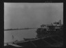 Arnold Genthe / Paddle wheel steamboat on river, New Orleans / between 1920 and 1926