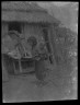 Arnold Genthe / Ainu child carrying a baby on back / 1908