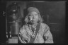 Arnold Genthe / Ainu woman wearing a headscarf, earrings, and a necklace / 1908