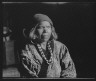 Arnold Genthe / Ainu woman wearing a headscarf, earrings, and a necklace / 1908