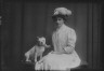 Arnold Genthe / Roos, Leon, Mrs., with dog, portrait photograph / 1907 May 30