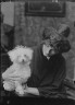 Arnold Genthe / Dale, Gladys, Miss, with dog, portrait photograph / 1911 Nov. 14