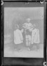 Arnold Genthe / Three children talking to a man, Chinatown, San Francisco / between 1896 and 1906