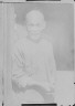 Arnold Genthe / The Chinese cook, grinning from the doorway, Chinatown, San Francisco / between 1896 and 1906