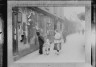 Arnold Genthe / Reading the Tong proclamation, Chinatown, San Francisco / between 1896 and 1906