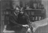 Arnold Genthe / Arnold Genthe seated next to a woman friend in his studio in San Francisco / between 1896 and 1911