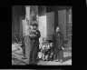 Arnold Genthe / Waiting for the car, Chinatown, San Francisco / between 1896 and 1942; from a photograph taken between 1896 and 1906