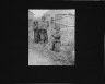 Arnold Genthe / Three Ainu children standing by a fence / between 1908 and 1942; from a negative taken in 1908