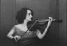 Arnold Genthe / Unidentified woman playing the violin, portrait photograph / between 1911 and 1942