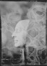 Arnold Genthe / Kennedy, Foster, Dr., mask / 1932 July