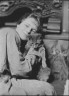 Arnold Genthe / Cutler, Miss, with Buzzer the cat, portrait photograph / 1915 May 26